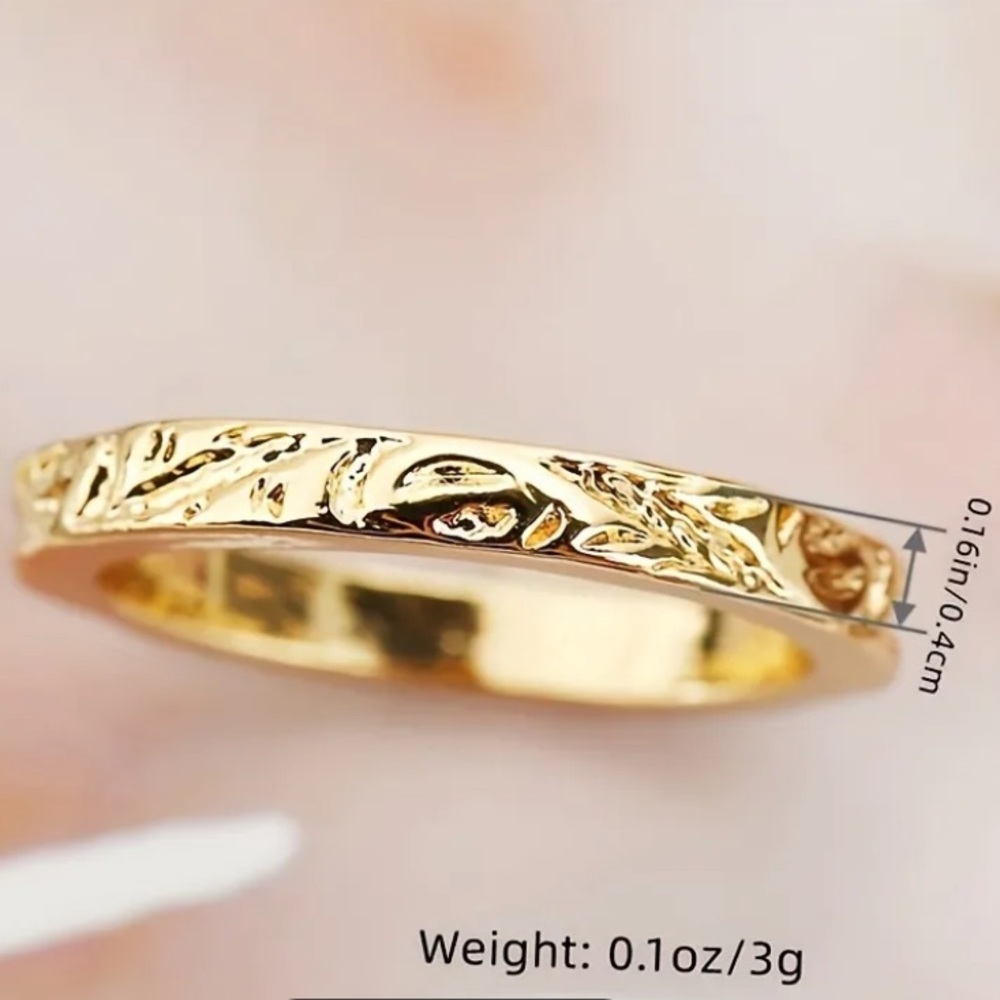 14k plated gold ring. Flower engraved. Size 5. Never used .
